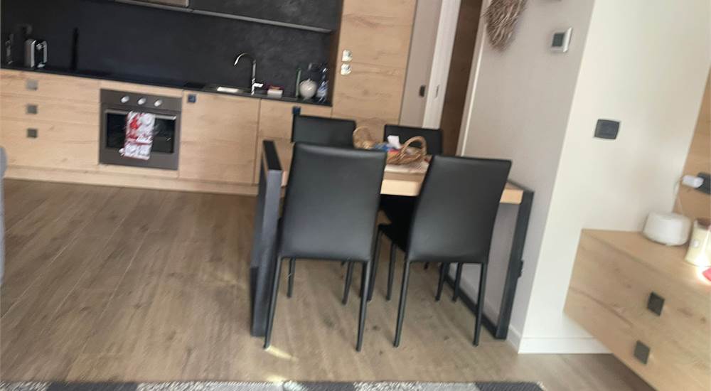 Sala con  cucina a vista 